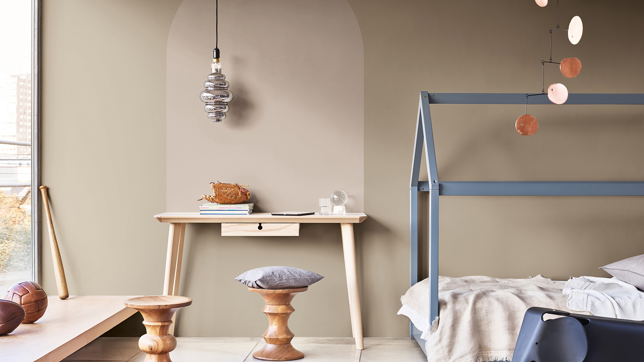 Painted arch above desk with child’s bed Painted arch above desk with child’s bed